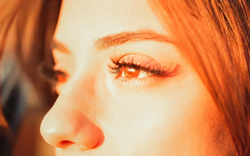 A vivid close-up shot highlighting the intricate details of a woman's eye.
