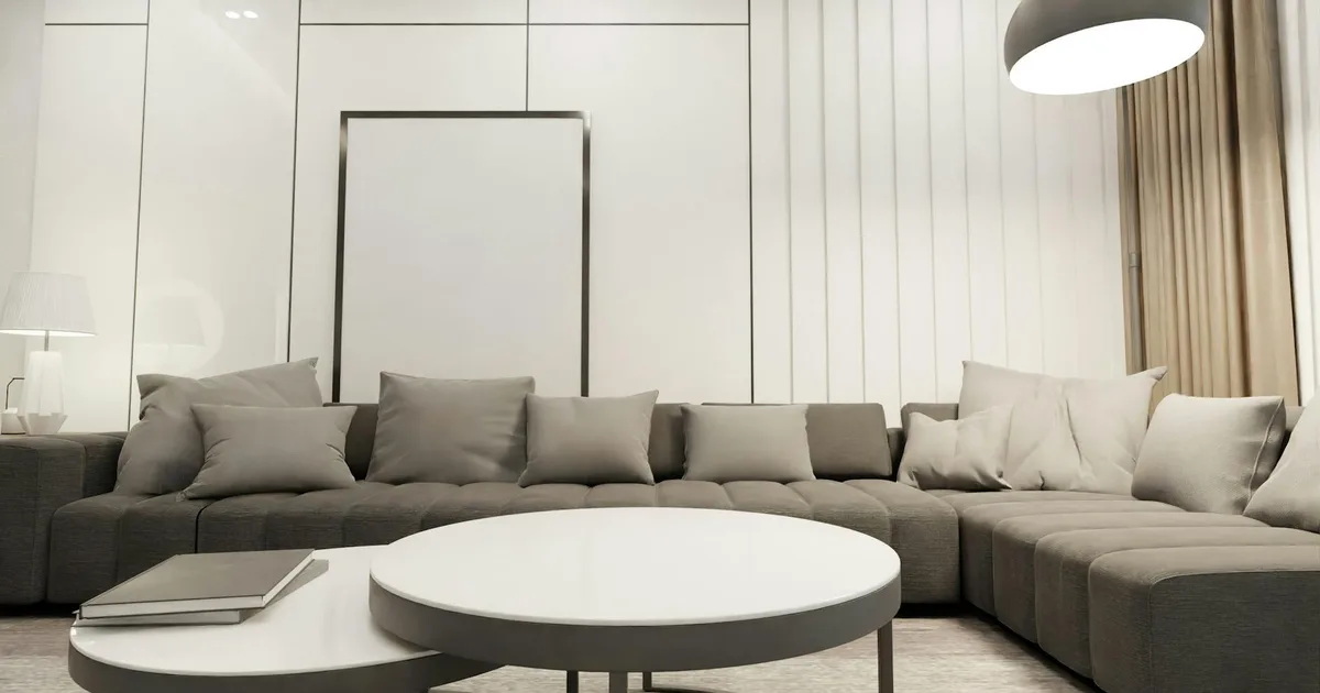 A stylish and comfortable modern living room with a minimalist design and neutral tones.