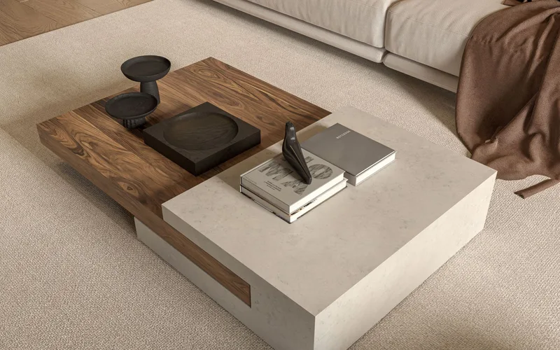 Elegant modern living room featuring a textured coffee table, cozy couch, and minimal decor.
